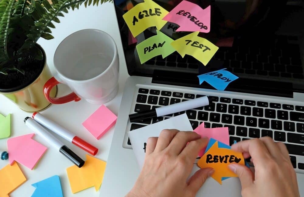 It,Worker,With,Agile,Board.,Using,Scrum,Board,For,Task